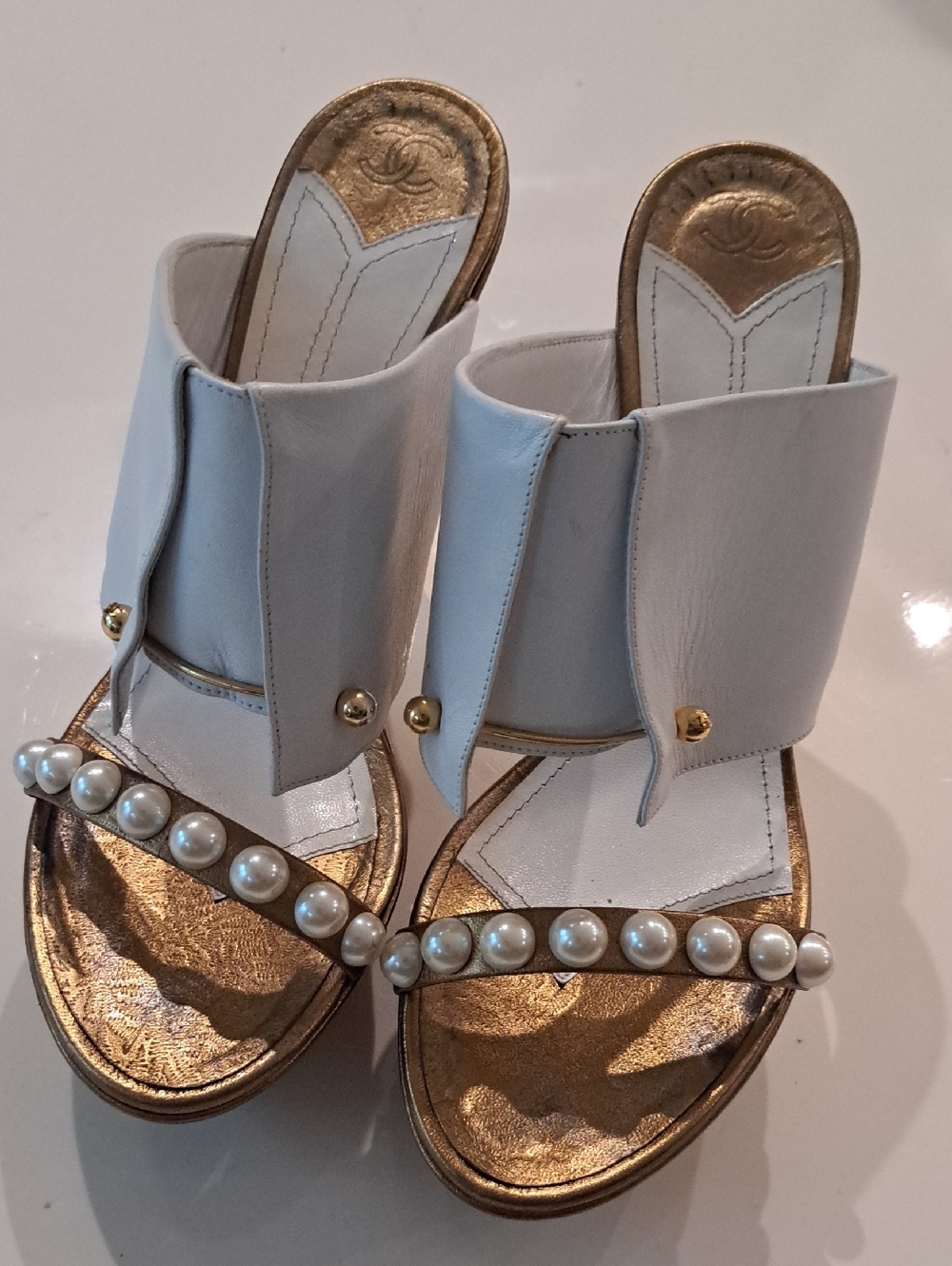 CHANEL White Leather Pearl-Trim Mules with Gold Footbed